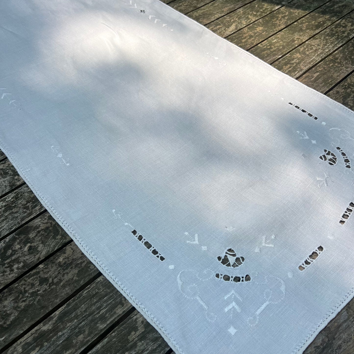 cream table runner with reticella embroidery