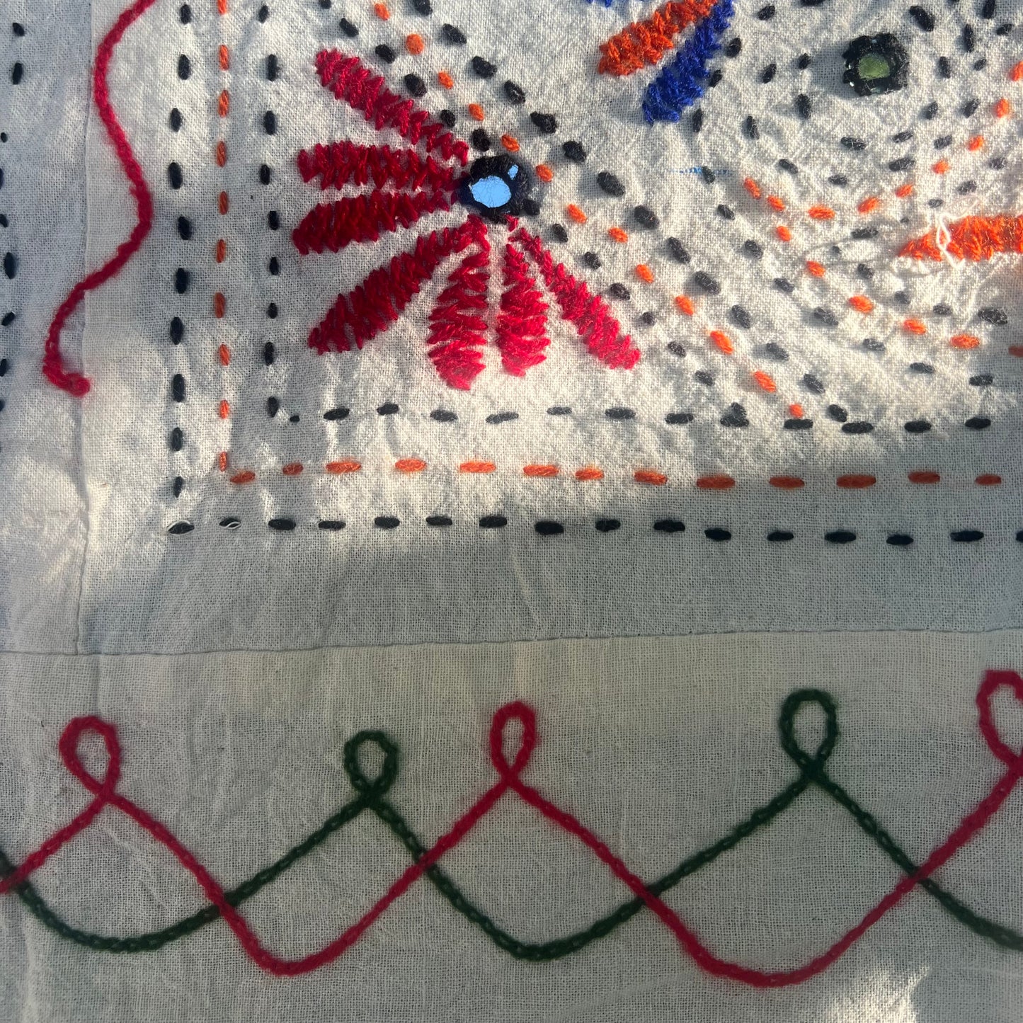 cream tablecloth with colorful hand embroidery