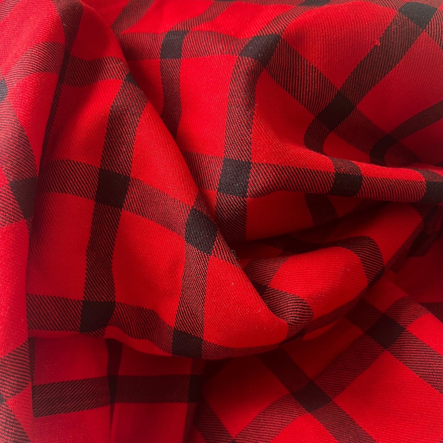 red and black plaid woven fabric sold all together; 1 5/8 yard