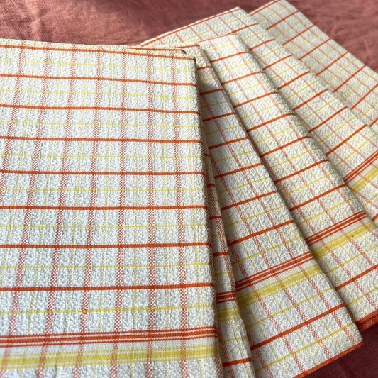 Orange and yellow vintage dish towels sold in sets of 2